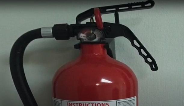 Monroe Fire Department Demonstrates Fire Extinguisher